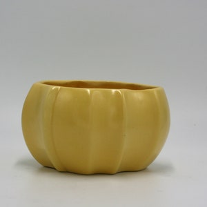 vintage yellow pottery indoor planter