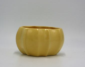 vintage yellow pottery indoor planter