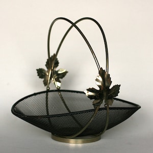 vintage mid century black mesh basket with double handle and leaf detail image 1