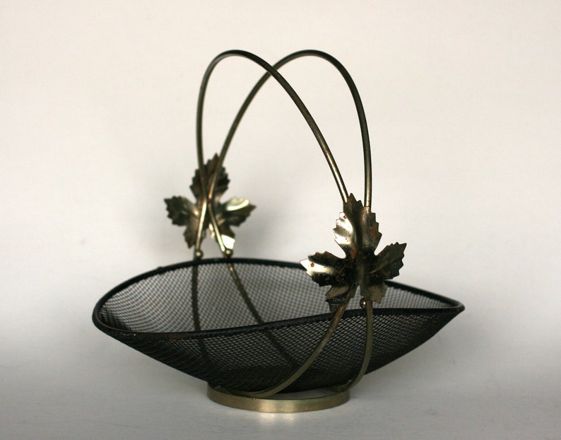 vintage mid century black mesh basket with double handle and leaf detail image 1