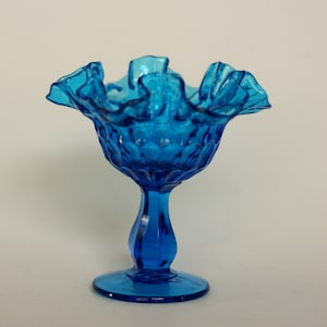 vintage fenton colonial blue thumbprint footed compote with ruffled edge image 1