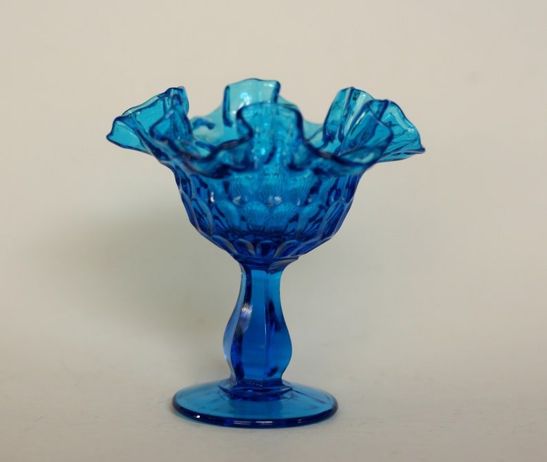 vintage fenton colonial blue thumbprint footed compote with ruffled edge image 1