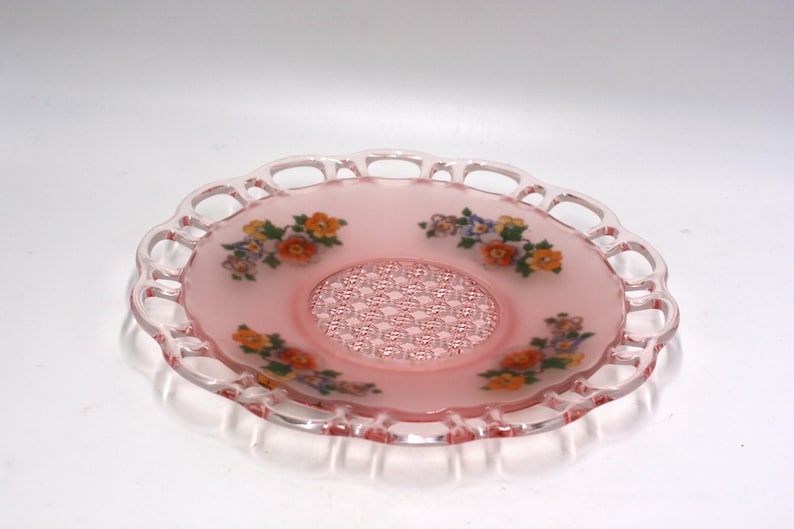 vintage pink satin depression glass plate with lace edge. reverse painted image 1