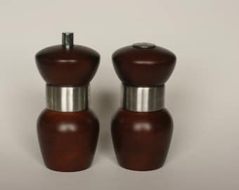 vintage mr dudley salt shaker and pepper grinder/wood with stainless steel band