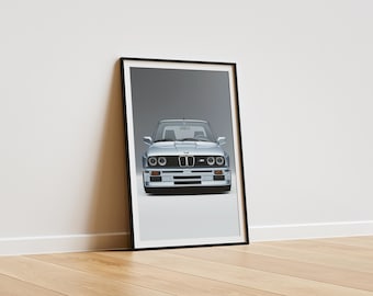 May include: A framed print of a silver BMW E30 M3 with black accents. The car is facing the camera and is set against a gray background.