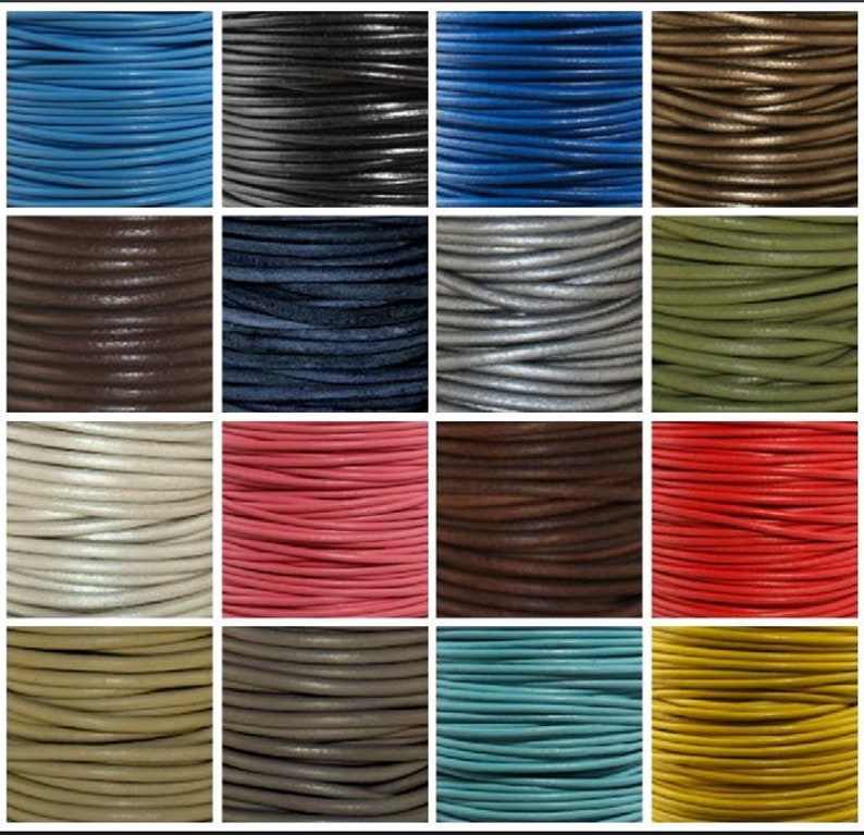 May include: A collection of 16 spools of leather cord in various colors, including blue, black, brown, gray, white, pink, red, green, beige, and yellow. The cords are all the same thickness and are wound tightly on the spools.