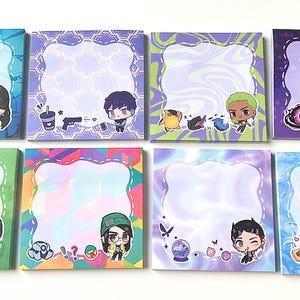 May include: A collection of eight square sticky note pads. Each pad features a unique colorful border and a cartoon character illustration. The pads have a wavy, decorative edge and are designed for writing notes.