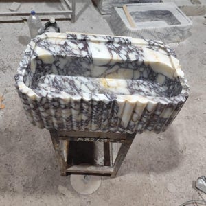 Hand-Carved Calacatta Viola Marble Sink: Fluted Wall-Mounted Washbasin