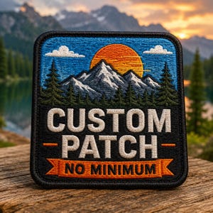 May include: A square embroidered patch featuring a mountain landscape with a bright orange sun, blue sky, white clouds, and dark green pine trees. The text CUSTOM PATCH is in white, and NO MINIMUM is in black on an orange banner at the bottom.