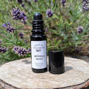 Kindled Light – Botanical Perfume Oil. Natural fragrance with jasmine, vanilla, sandalwood, spices, and wildcrafted resins. Alcohol-free.