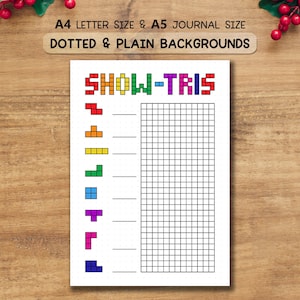 May include: A white journal page with the text "SHOW-TRIS" in colorful pixelated letters. The page features Tetris game pieces in various colors and a grid for scoring. The top of the page reads "A4 LETTER SIZE & A5 JOURNAL SIZE" and "DOTTED & PLAIN BACKGROUNDS".