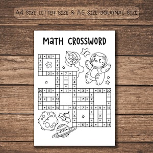 May include: A white math crossword puzzle with the title "MATH CROSSWORD" in a bold, black font. The puzzle features a rocket, a cat in a spacesuit, and other space-themed illustrations. The text "A4 SIZE LETTER SIZE & A5 SIZE JOURNAL SIZE" is at the top.