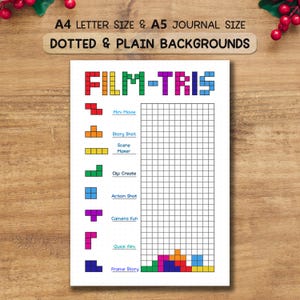 May include: A white journal page with the title "FILM-TRIS" in colourful block letters. The page includes a grid for notes and colourful Tetris-like shapes with related text such as "Mini Movie" and "Story Shot". The journal is designed for film enthusiasts.