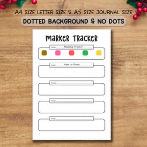 May include: A white marker tracker journal page with the text "Marker Tracker" at the top. The page includes sections for tracking reading and year in pixels, with dotted background and no dots. The text "A4 SIZE LETTER SIZE & A5 SIZE JOURNAL SIZE" is at the top.