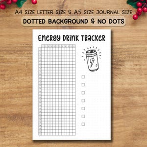 May include: A white journal page with the text "ENERGY DRINK TRACKER" and a grid for tracking. Includes a drawing of an energy drink can with a lightning bolt. The text "A4 SIZE LETTER SIZE & A5 SIZE JOURNAL SIZE" is at the top.