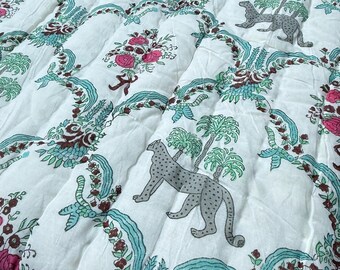 Pathika - Reversible Indian Quilt. Leopard Print with Red Floral Pattern with Grey Background