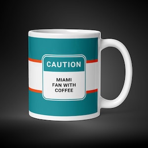 Miami Dolphins mug for Miami football fan Miami Dolphins gift for him funny sports coffee cup caution Miami fan with coffee