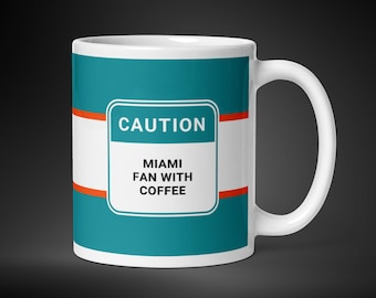Miami Dolphins mug for Miami football fan Miami Dolphins gift for him funny sports coffee cup caution Miami fan with coffee
