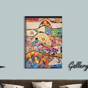 May include: A colorful mosaic art print with a "Gallery Wrap" finish. The artwork features a vibrant mix of colors and patterns, including red, blue, yellow, and green. The mosaic design depicts abstract shapes and forms, creating a visually engaging piece.