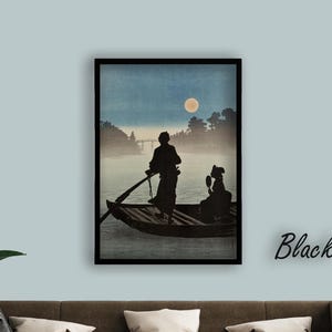May include: A framed print depicting a boat scene with two figures silhouetted against a misty backdrop. The artwork features a full moon and a bridge in the distance. The frame is black, and the text "Black Frame" is written in cursive.