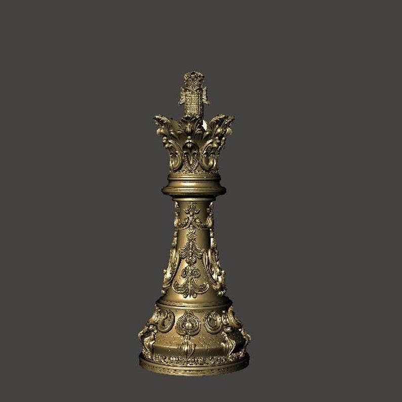 May include: A gold-colored chess king piece with ornate detailing. The piece has a tall, decorative crown and intricate carvings along its body. The chess piece is a classic design, suitable for a chess set.
