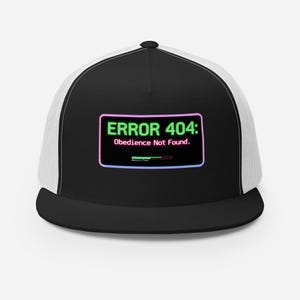 May include: Black and white trucker hat with a neon green and pink graphic that reads "ERROR 404: Obedience Not Found."