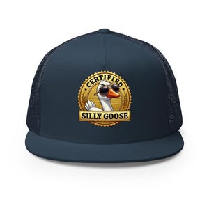 May include: A navy blue trucker hat with a gold and white logo that says "Certified Silly Goose". The logo features a cartoon goose wearing sunglasses.