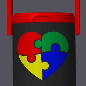 May include: Black water cooler with a red handle and lid. The cooler features a heart-shaped design made of four puzzle pieces in red, green, yellow, and blue. A red spigot is at the bottom.
