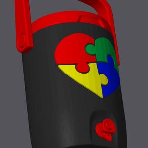May include: A black water cooler with a red handle and a red dispensing button. The cooler features a colorful puzzle piece design in red, green, yellow, and blue. The handle is arched.