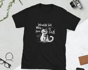 May include: Black t-shirt with a white graphic of a cat and the text "Introverted but willing to discuss cats".