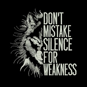 May include: A black and white image of a wolf's head with the text "Don't mistake silence for weakness" in white.