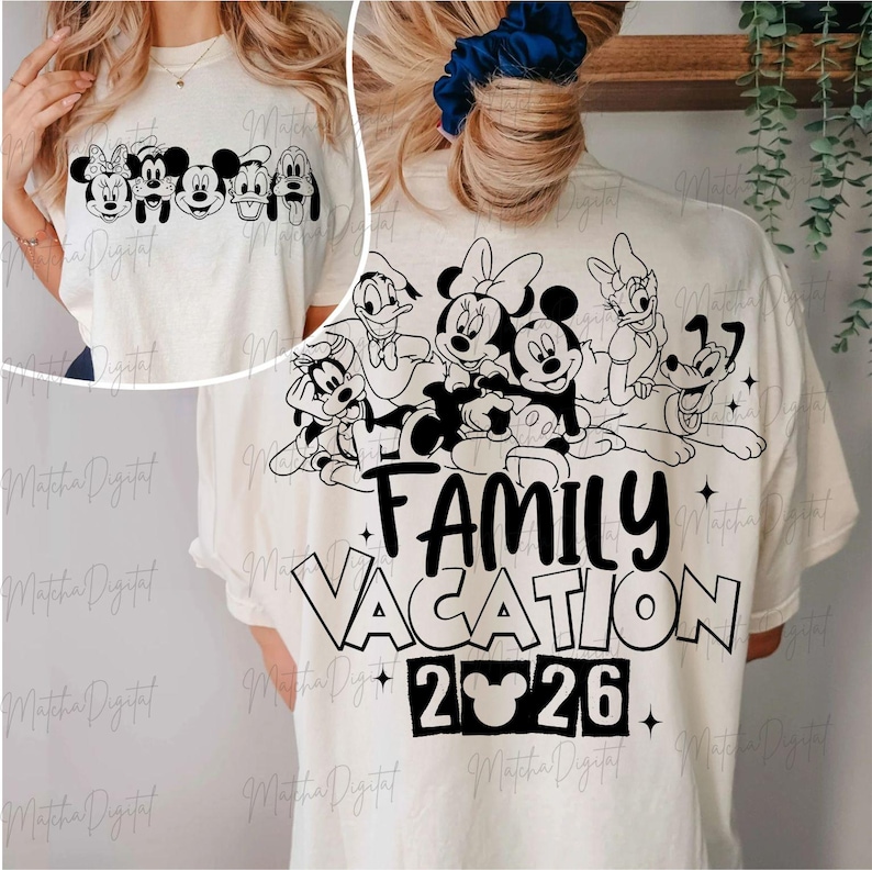 May include: Cream-colored t-shirt featuring a black and white graphic of Disney characters, including Mickey and Minnie Mouse, and the text "FAMILY VACATION 2026". The front of the shirt shows the characters' faces.