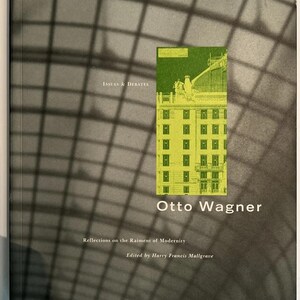 May include: Book cover featuring the title "Otto Wagner" with the subtitle "Reflections on the Raiment of Modernity." The cover has a green and yellow architectural image and the text "ISSUES & DEBATES."
