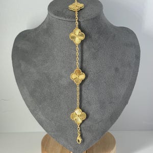 Gold guilloche motif clover bracelet 18k gold plated (with serials)