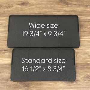 May include: Two black rectangular items with rounded corners are displayed. The top one is labeled "Wide size" and measures 19 3/4" x 9 3/4". The bottom one is labeled "Standard size" and measures 16 1/2" x 8 3/4".