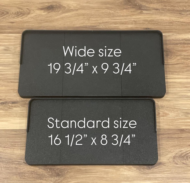 May include: Two black rectangular items with rounded corners are displayed. The top one is labeled "Wide size" and measures 19 3/4" x 9 3/4". The bottom one is labeled "Standard size" and measures 16 1/2" x 8 3/4".