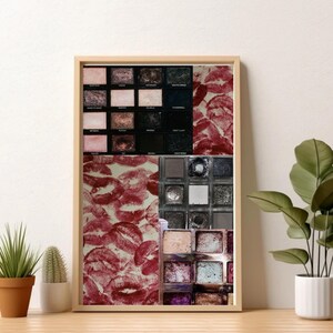 May include: A framed collage of makeup palettes with various shades of eyeshadow, blush, and lipstick. The palettes are arranged in a grid pattern and are surrounded by a red background with lipstick kisses.