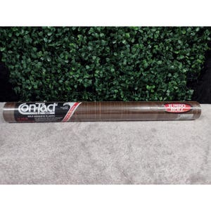 May include: A roll of brown self-adhesive plastic with a wood grain pattern. The label reads "on-Tact" and "Jumbo Roll". The roll is 36 inches wide.