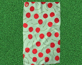 Cherrys Golftuch: Farbenfrohes, kokettes Golf-Zubehör