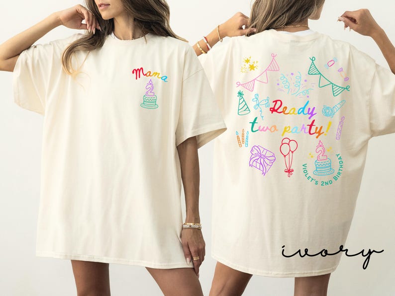 May include: An ivory t-shirt featuring a small colorful graphic on the front chest with the word Mama and a birthday cake. The back displays the text Ready two party! with illustrations of bunting, balloons, a gift, and Violet's 2nd birthday.