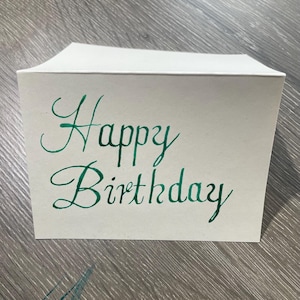 Cartão verde de feliz aniversário