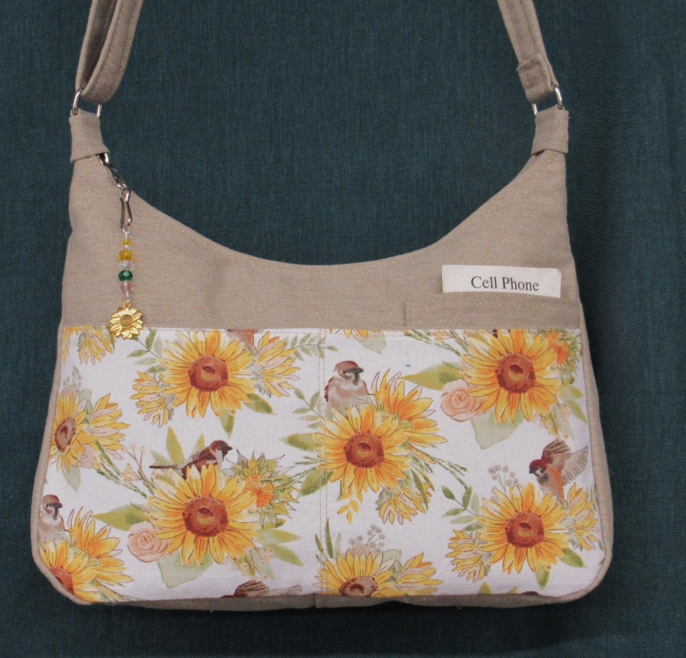 Sunflower & Birds  Medium Handbag Cell pocket in front 2 more 12 inch back pocket 2 inside. Light color cotton lining. Summer or fall