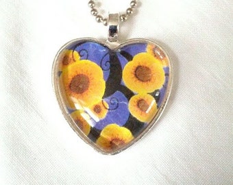 Cobalt Blue and Sunny Yellow Floral Glass Heart Pendant. Lovingly Handmade in Brooklyn by Wishing Well Studio.