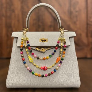 Handmade Ceramic Fish Bag Charm: Polkadot Beads, Gold Accents