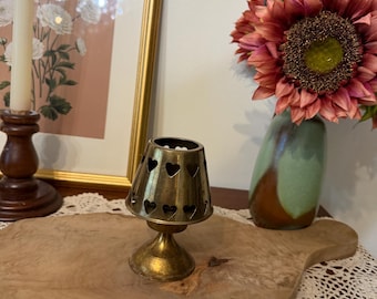 Vintage Brass tea light holder with heart cut outs.