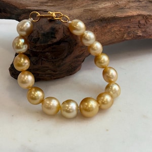 Bransoletka Elly's Genius 9,8-12,5 mm 15 szt. złotych pereł Ocean Pearls z Morza Południowego: ekstremalny połysk, 8,1”, bransoleta ze srebra próby 925.