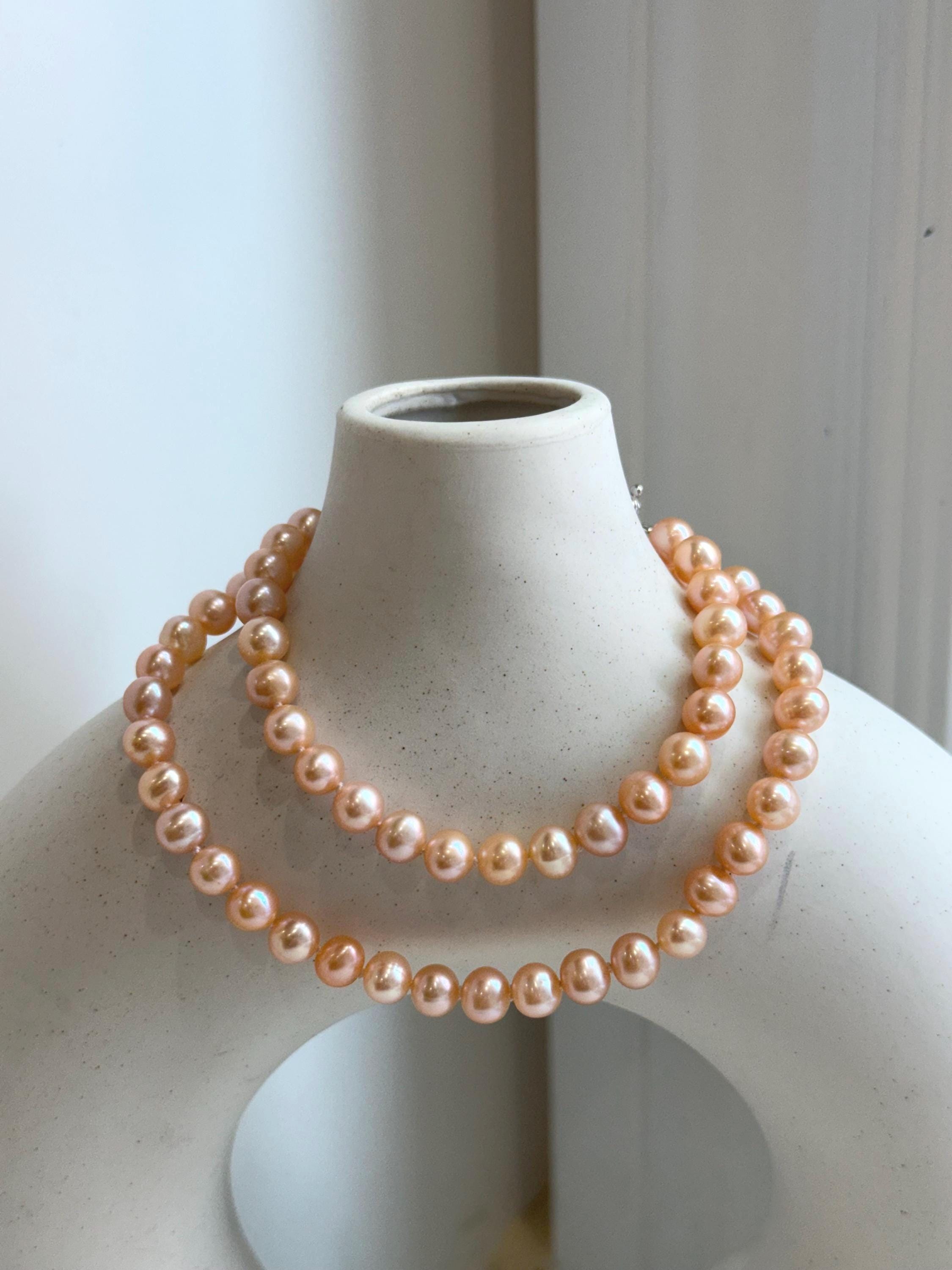 Elly's Peach Pearls Necklace: Extreme Luster Mirrored Effect, 6.2