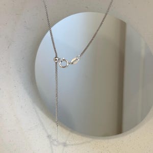 Not for seperate purchase!! 1mm thick s925 silver chopin chain necklace, adjustable size to 19.3” long, with needle for floating pendant.
