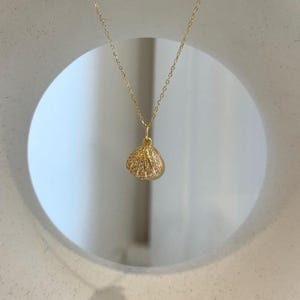Elly’s 8.1mm South Sea deep tea Gold ocean Pearl Shell pendant: Extreme luster mirrored, 1.1x1.5cm, S925 silver pendant.