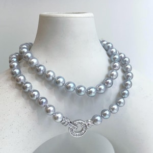 63pcs 6-6.4mm Strong luster Akoya Natural Silver Blue color Pink Hue pearls necklace choker elegant gift for anniversary gift. 17.3” knotted